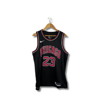 Load image into Gallery viewer, NBA - * NEW WITH TAGS * CHICAGO BULLS #23 MICHAEL JORDAN NIKE SWINGMAN JERSEY
