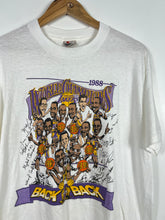 Load image into Gallery viewer, NBA - L.A LAKERS 1988 BACK 2 BACK VINTAGE CARICATURE T-SHIRT - MENS LARGE ( SLIM FIT ). OR MENS MEDIUM
